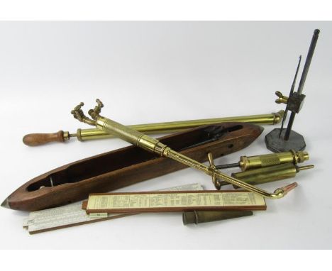 A brass gin tap, Enots motorcycle spring fork gun, rose sprayer, brass syringe and sundry collectables.