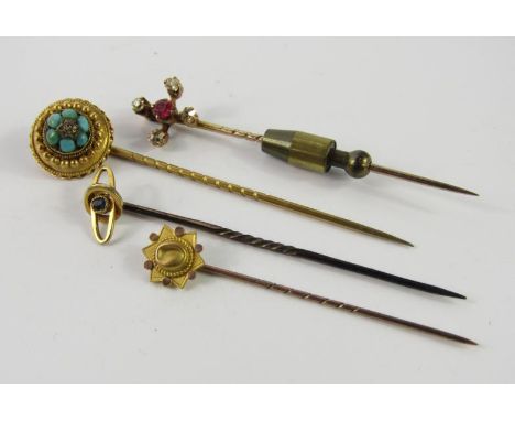 A yellow metal ruby and diamond tie pin of cross form, sapphire set tie pie, yellow metal, diamond and turquoise set tie pin,