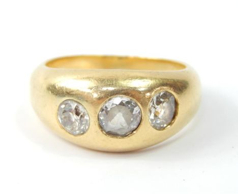 An 18ct gold and diamond gentleman's three stone gypsy ring, set with rose cut diamonds, approx 1.2cts, size R/S, 12.9g.