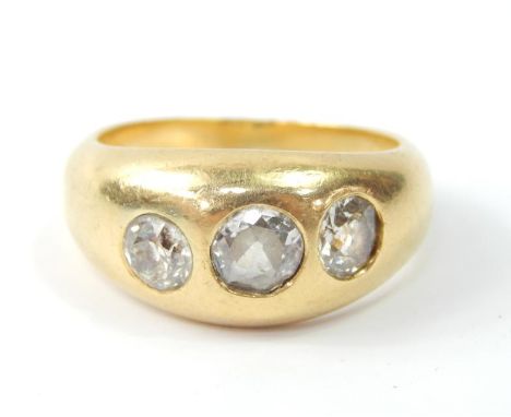 An 18ct gold and diamond gentleman's three stone gypsy ring, set with rose cut diamonds, approx 1.2cts, size R/S, 12.9g.