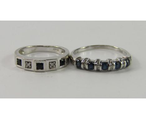 A white metal sapphire and diamond five stone band, stamped 375, size J, and a 9ct white gold sapphire and diamond ring, size