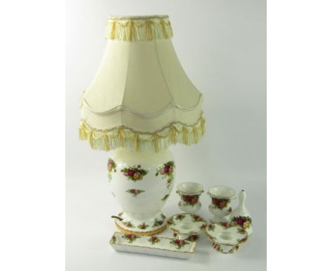 A Royal Albert porcelain baluster table lamp, decorated in the Old Country Roses pattern, together with a pair of small vases