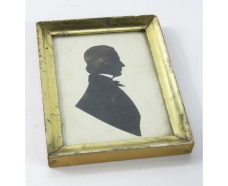 An early 19thC silhouette portrait of the Rev Henry Richard Marsock Lateward MA, 12cm x 8cm.
