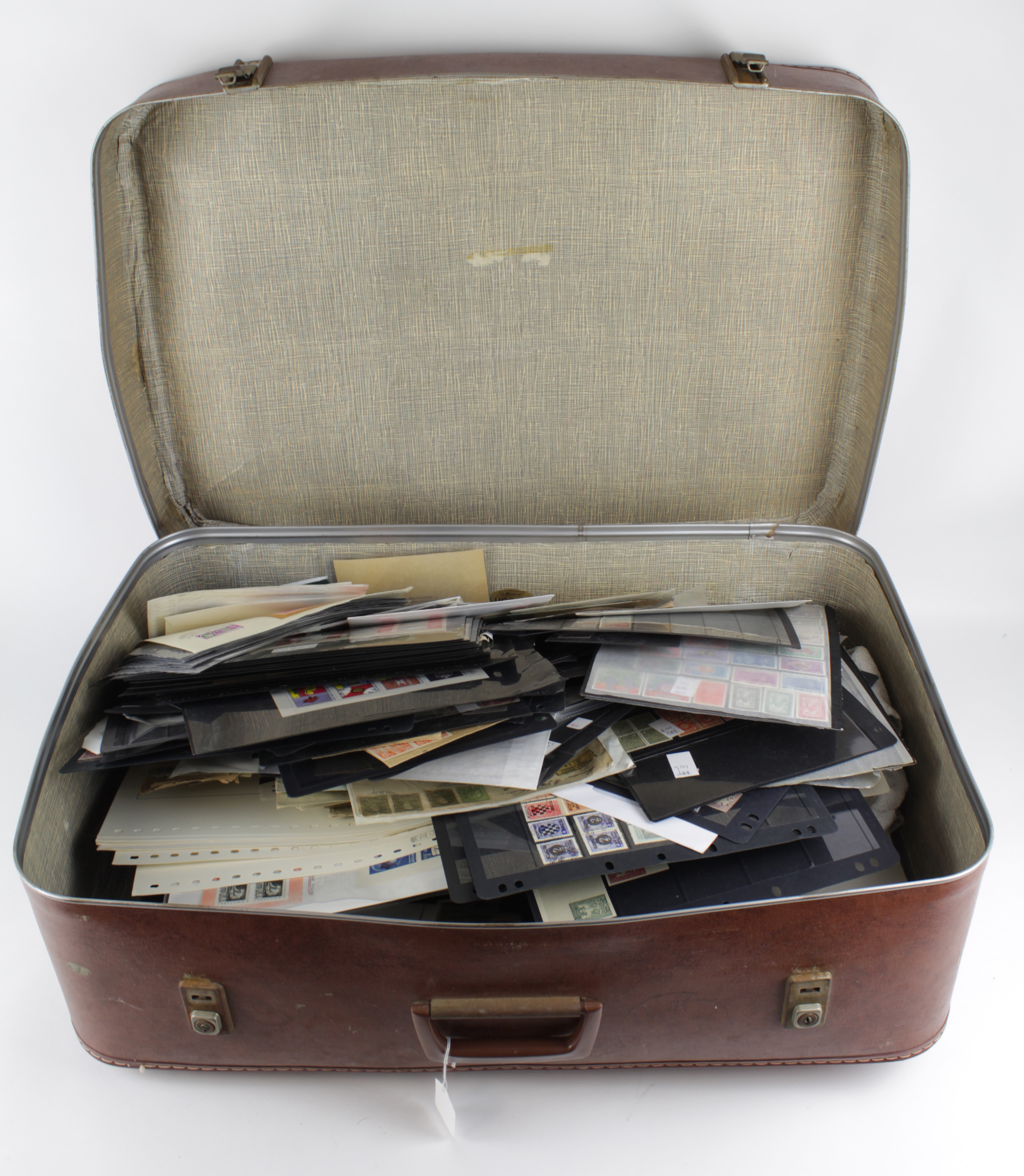 Giant suitcase with a good mixed lot of various material, many better