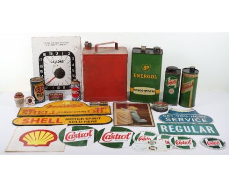 Selection of vintage oil cans and signs, incuding Castrollo lubricant, BP Energol, STP Oil treatment, and RAC Get You Home Se