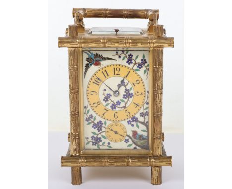 A fine 19th century gilt brass French Drocourt carriage clock with porcelain panel with cloisonne decoration in the Oriental 