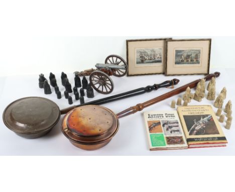 A mixed lot, including a Lewis chessmen set, a desk cannon, two Hervey Naval History engravings framed, two bed warming pans,