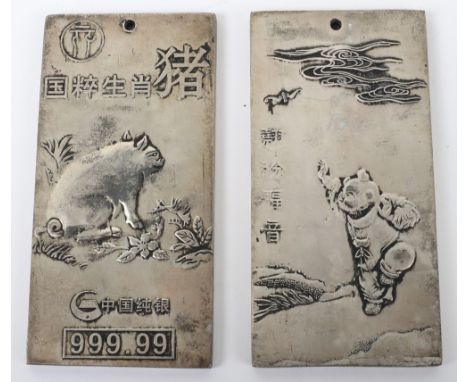 Two Chinese silver ingots depicting Year of the pig and another, pig 134g the other 154g, (2)