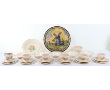 A Susie Cooper ‘Patricia Rose’ tea service, of five tea cups, six saucers, six tea plates, sugar bowl, milk jug, fruit bowl a
