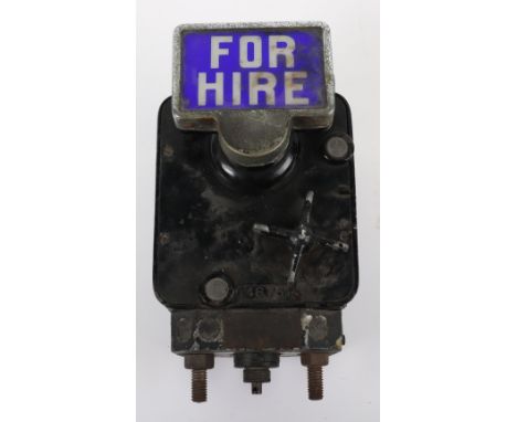 A vintage taxi meter by Geecen Ltd, with flip up ‘For Hire’ light, 14cmW