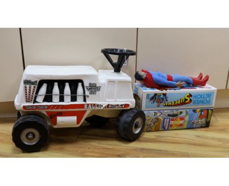 A Denys Fisher Superman, rare, in original box, another unboxed, a Unigate milk float with bottles, and a boxed Evel Knievel 