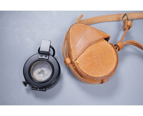 An E.R Watts and Son military compass, 1939 No 3233 MKIII in a leather case