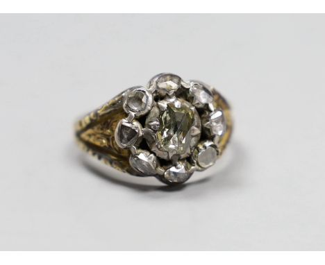 An early 19th century gold overlay and silver, rose diamond cluster ring, size P, gross 6.3 grams