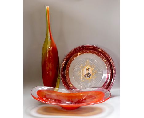 A Kosta Boda glass vase, signed K Engman, a signed art glass dish and a large French glass plate, tallest 54cm
Condition:Kost