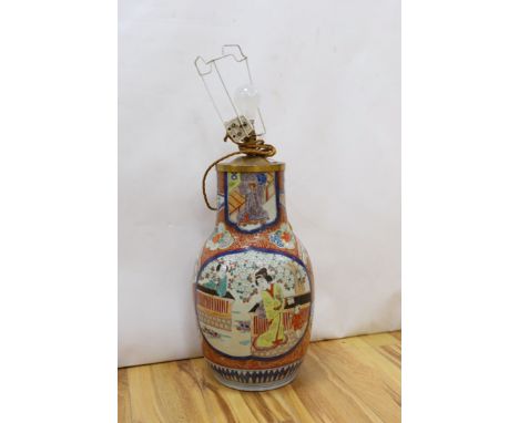 A Japanese Kutani vase, painted with figures (cut down and fitted as a table lamp), total height 57cm