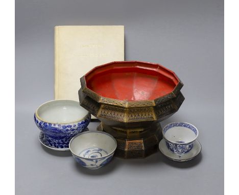 A collection of Chinese blue and white tea bowls, a vase, metal planter and book on Hong Kong by John and Veronica Stericker,
