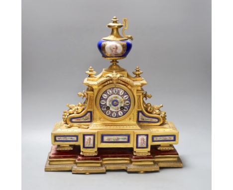 A 19th century French gilt metal and Sevres style enamel mantel clock, 37cm wide