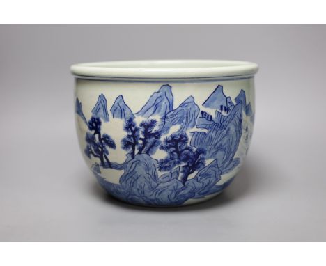 A late 19th century Chinese blue and white planter, 23cm diameter
