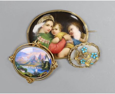 A Victorian 15ct gold mounted porcelain plaque, decorated with the Madonna della Sedia, 8cm, a Swiss landscape enamel brooch 
