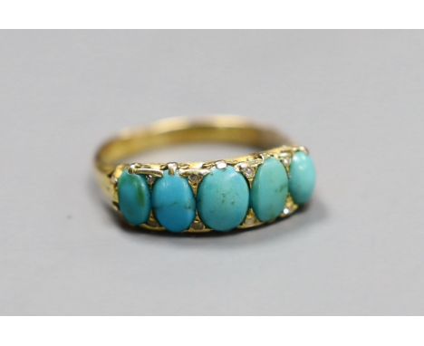 An 18ct gold turquoise set five stone half hoop ring with diamond chip intersections, size R, gross 3.5 grams