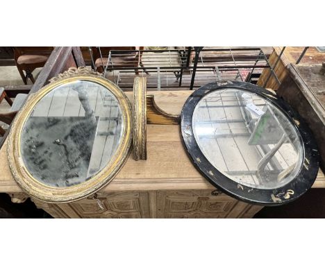 An oval gilt framed wall mirror, height 70cm, a matching wall bracket and an oval chinoiserie lacquered wall mirror, height 4