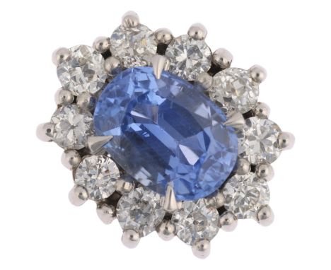 A Sri Lankan 'No Heat' sapphire and diamond oval cluster ring, centrally claw set with 2.44ct oval mixed-cut sapphire surroun