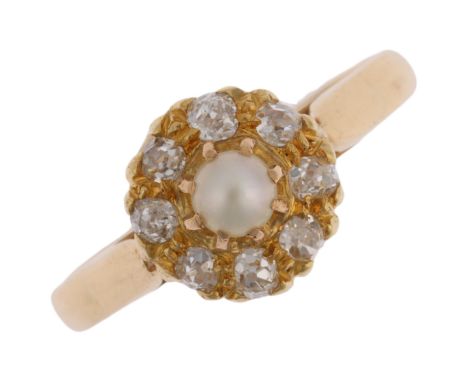 An early 20th century whole pearl and diamond flowerhead cluster ring, claw set with 3.6mm pearl surrounded by old-cut diamon