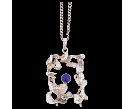 HERMANN SIERSBOL - a Danish brutalist sterling silver lapis lazuli abstract openwork pendant necklace, on silver flat curb li
