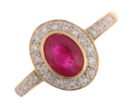 A modern 18ct gold ruby and diamond oval cluster ring, rub-over set with oval mixed-cut ruby surrounded by modern round brill