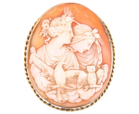 A 19th century shell 'Eos and Nyx' cameo brooch, relief carved depicting Goddesses, in unmarked yellow metal frame, 50.6mm, 1