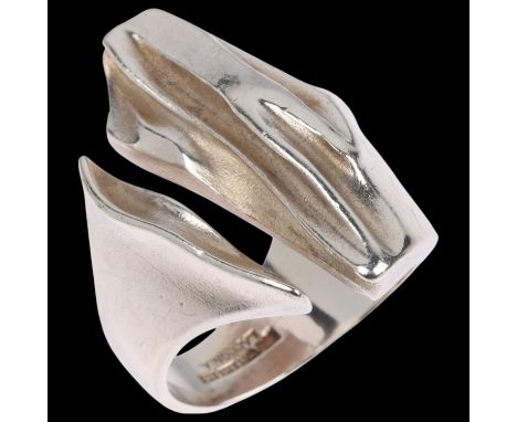 LAPPONIA - a large Swedish brutalist sterling silver torque ring, in the style of Bjorn Weckstrom, circa 1935, setting height