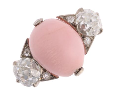 A Non-Nacreous Conch Pearl and diamond ring, the central 9.5mm egg-shaped conch pearl bead suspended on wire frame, flanked b