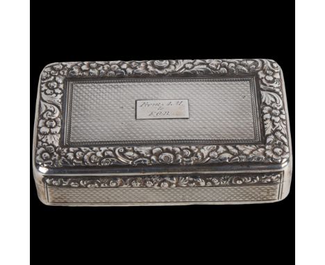 A William IV silver snuffbox, Thomas Edwards, London 1834, rectangular form, with engine turned decoration, relief floral bor