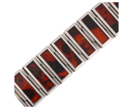 A late 20th century Polish sterling silver and Baltic amber panel bracelet, maker JZ, Gdansk, 20cm, 56.9gNo damage or repair,