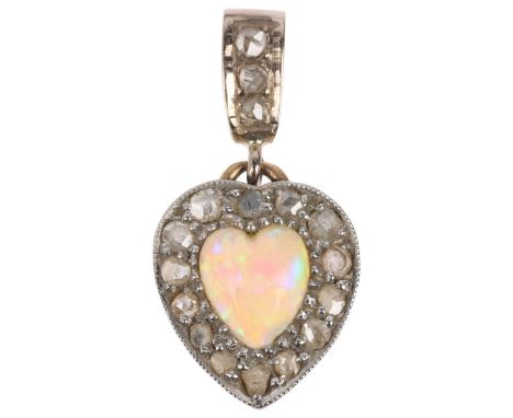 An early 20th century opal and diamond heart cluster drop pendant, circa 1910, centrally set with heart cabochon opal surroun