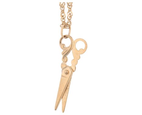A 9ct gold novelty scissors pendant necklace, on 9ct Prince of Wales link chain, pendant 28.4mm, chain 44cm, 2.2gNo damage or