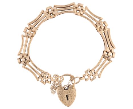 gA late 20th century 9ct gold gatelink chain bracelet, with 9ct heart padlock clasp, 18cm, 15.9gGeneral wear to high points, 