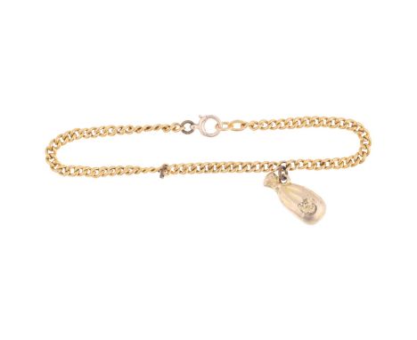 An 18ct gold hollow curb link chain bracelet with 9ct moneybag charm, 16cm, 2.1gNo broken links, clasp is a 9ct replacement, 