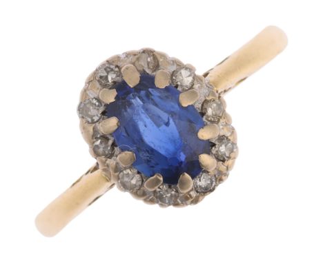 An 18ct gold sapphire and diamond oval cluster ring, platinum-topped with oval mixed-cut sapphire and single-cut diamonds, se