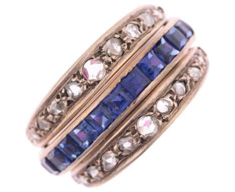 An Art Deco 'Day and Night' swivel eternity ring, half of the central band channel set with calibre-cut rubies and other half