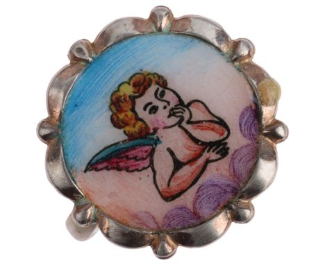 A Vintage enamel cherub ring, unmarked silver settings, setting height 17.7mm, size K, 4.7gEnamel has several faint hairline 