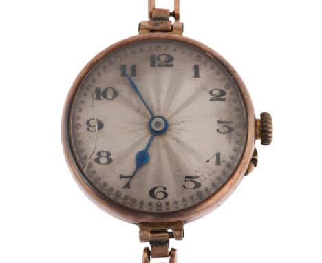 ROLEX - a First World War Period 9ct rose gold mechanical bracelet watch, silvered engine turned sunburst dial with Arabic nu