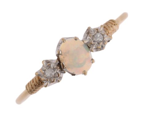 A late 20th century 9ct gold three stone opal and diamond ring, maker P&RB, Birmingham 1980, claw set with oval cabochon opal