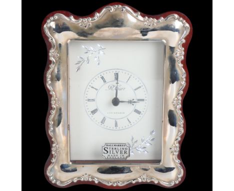 An Elizabeth II silver-fronted quartz mantel clock, R Carr, Sheffield 1991, 14.5cm x 11cm, boxedNew and unused 