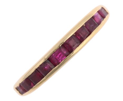An 18ct gold ruby half eternity ring, maker A&HR, London 1995, band width 3.5mm, size L, 3.1gNo damage or repair, all stones 