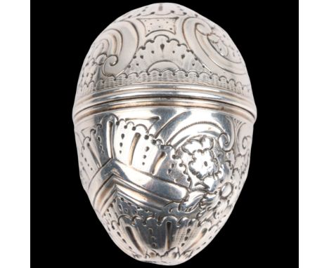 A George III silver egg nutmeg grater, maker SM, probably Samuel Meriton II, circa 1780, allover relief embossed foliate deco