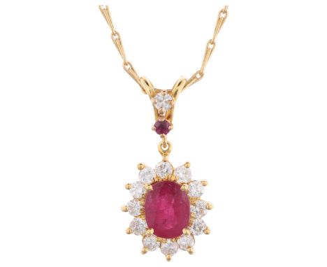 A French 18ct gold ruby and diamond flowerhead cluster pendant necklace, on 18ct fancy link chain, total diamond content appr