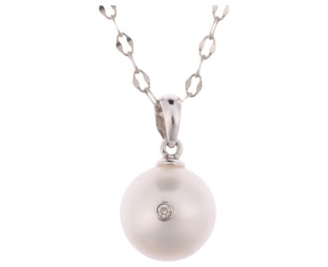 A modern 14ct white gold whole pearl and diamond pendant necklace, on 14ct cable link chain, set with 11.3mm pearl, chain 40c