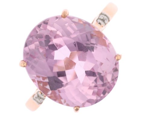 A modern 14ct rose gold kunzite and diamond dress ring, claw set with oval mixed-cut kunzite, kunzite measures: 14.11 x 12.05