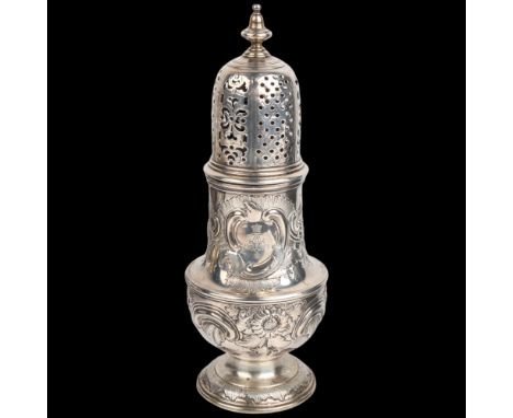 A George II silver baluster caster, Thomas Bamford, London 1734, with later relief embossed floral decoration and engraved cr